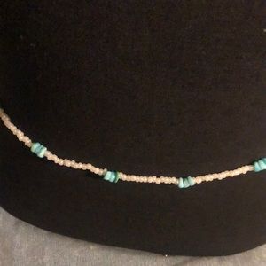 Light blue and white stone with white belly beads